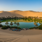 découvrez pourquoi l'oasis péruvienne de huacachina à ica fascine tant les voyageurs avec ses paysages désertiques uniques, ses dunes impressionnantes et son ambiance magique.